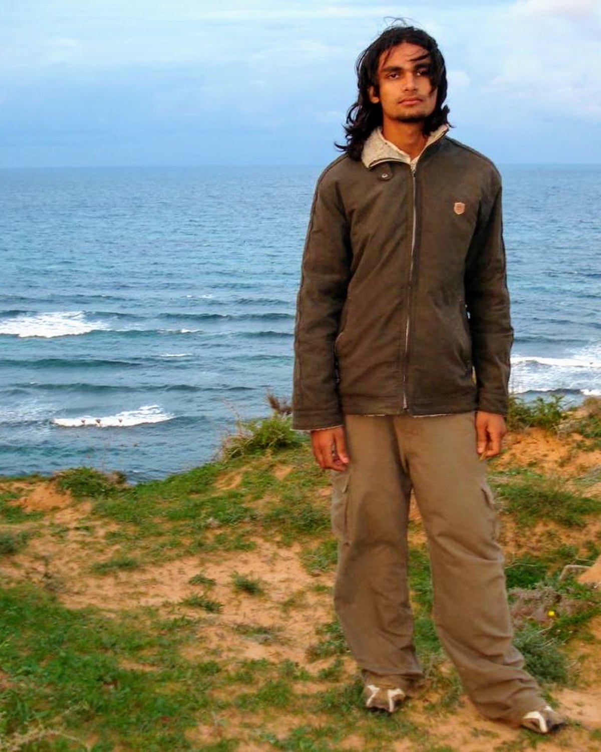 Naveed on the coast in Tripoli, before the war