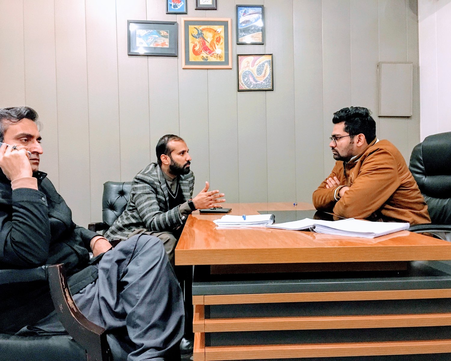 Naveed in a business meeting in Pakistan
